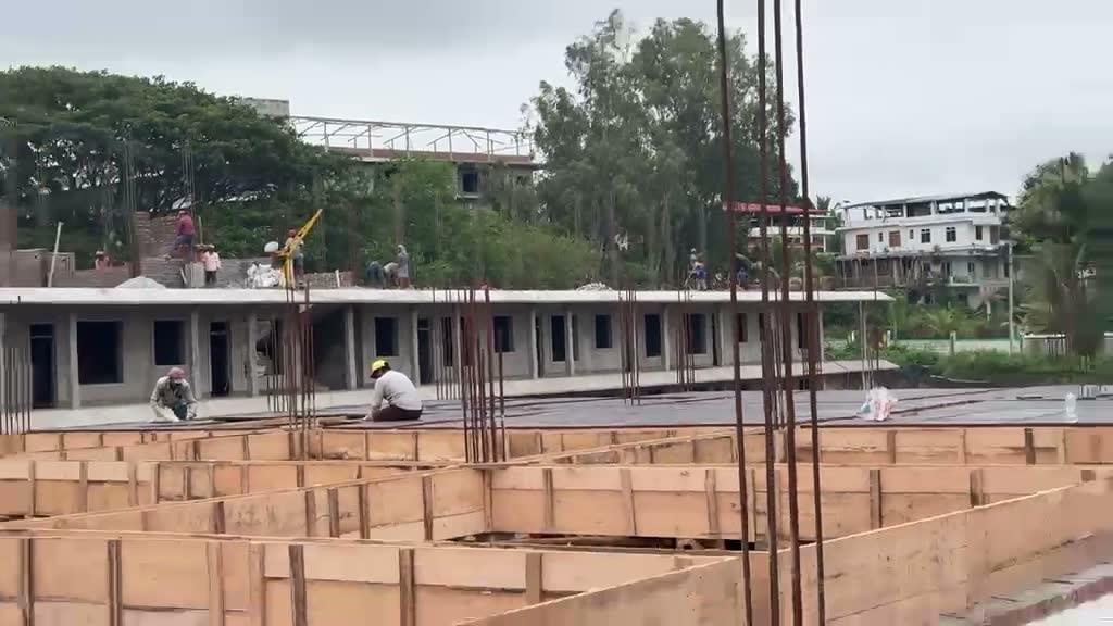 The new hostel building under construction, July 2026