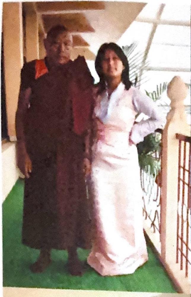 Geshe Lobsan Gyaltsen with the young woman he has raised since she was orphaned as a child