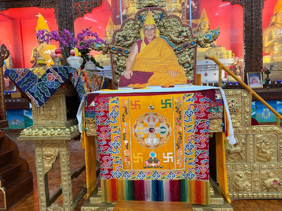 The golden throne of His Holiness the Dalai Lama in the prayer hall